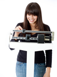 weight-loss-happy-woman-scale.jpg